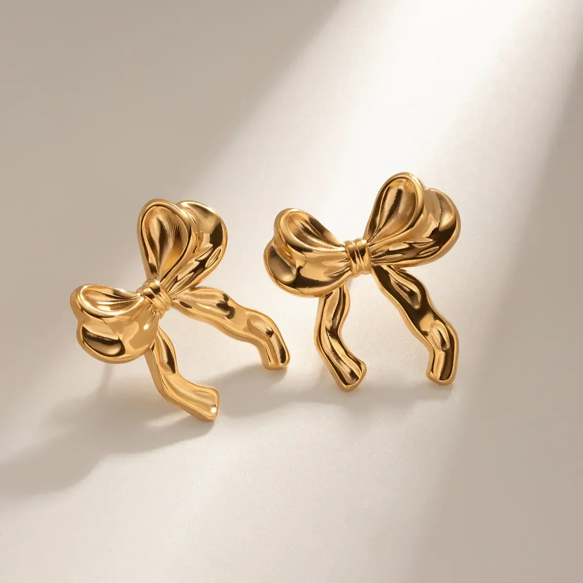 ARETES LAZO COQUETTE