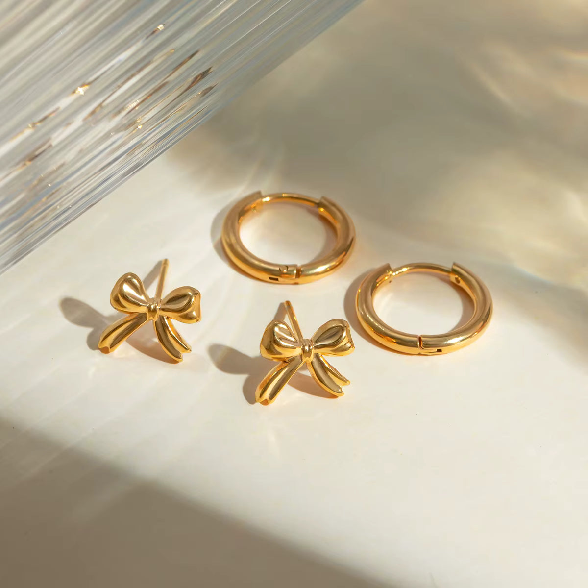 SET ARETES MOÑO LOVE